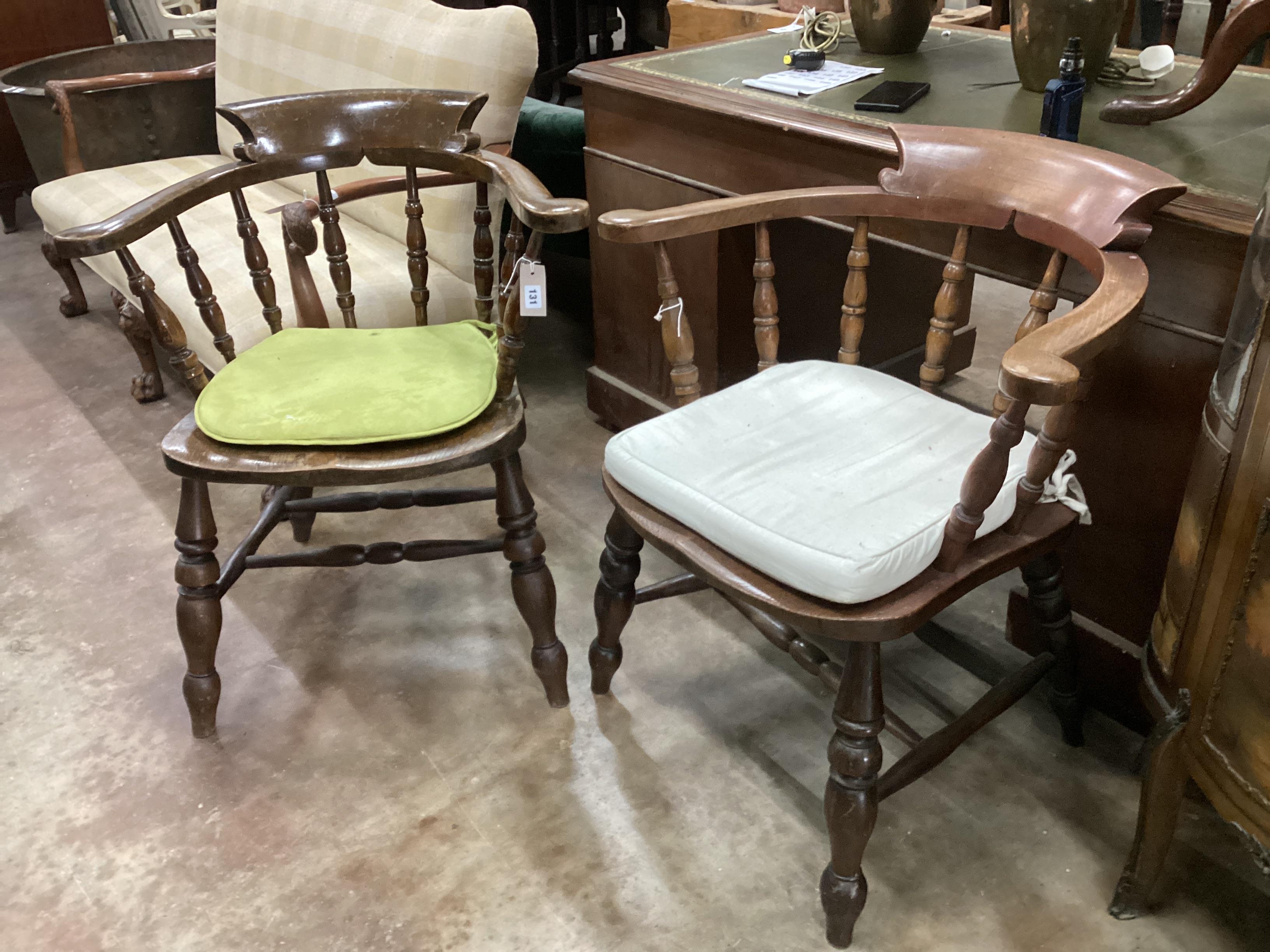 A near pair of late Victorian elm and beech Windsor smoker's bow chairs, width 69cm, depth 50cm, height 80cm